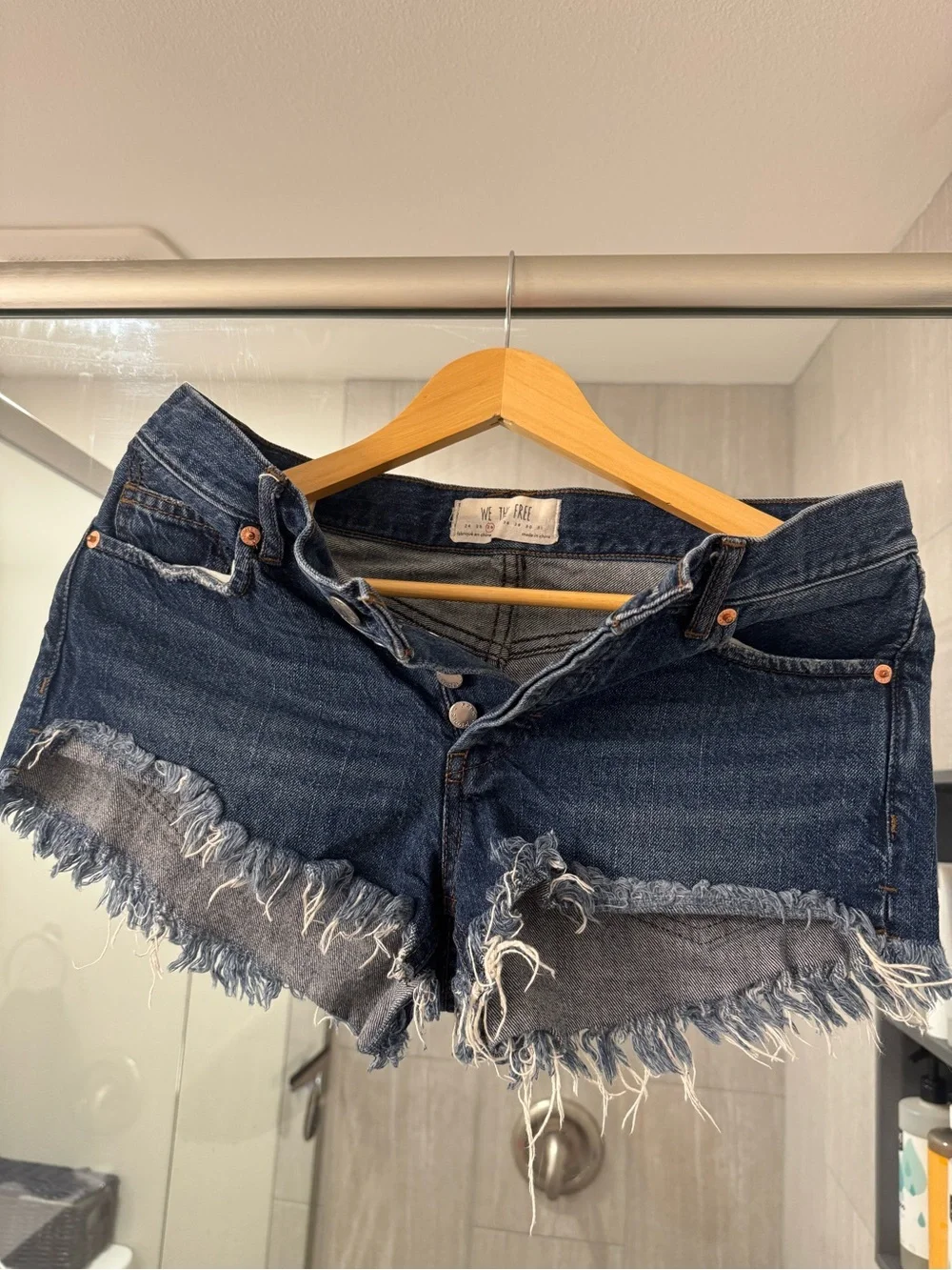 We The Free Dark Blue Distressed Denim Cutoff Shorts